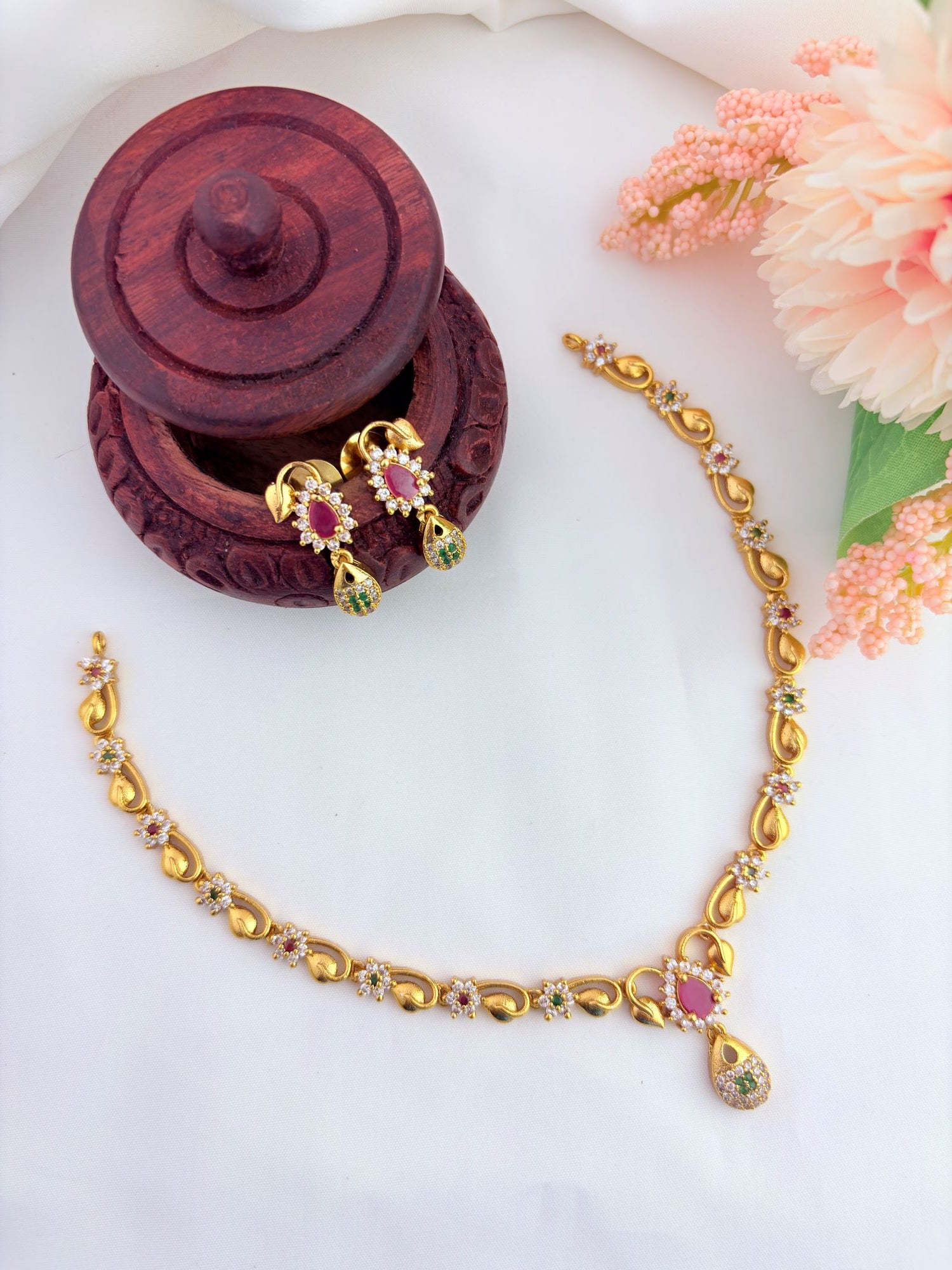 Elegant AD stone necklace in premium matte finish with matching earrings