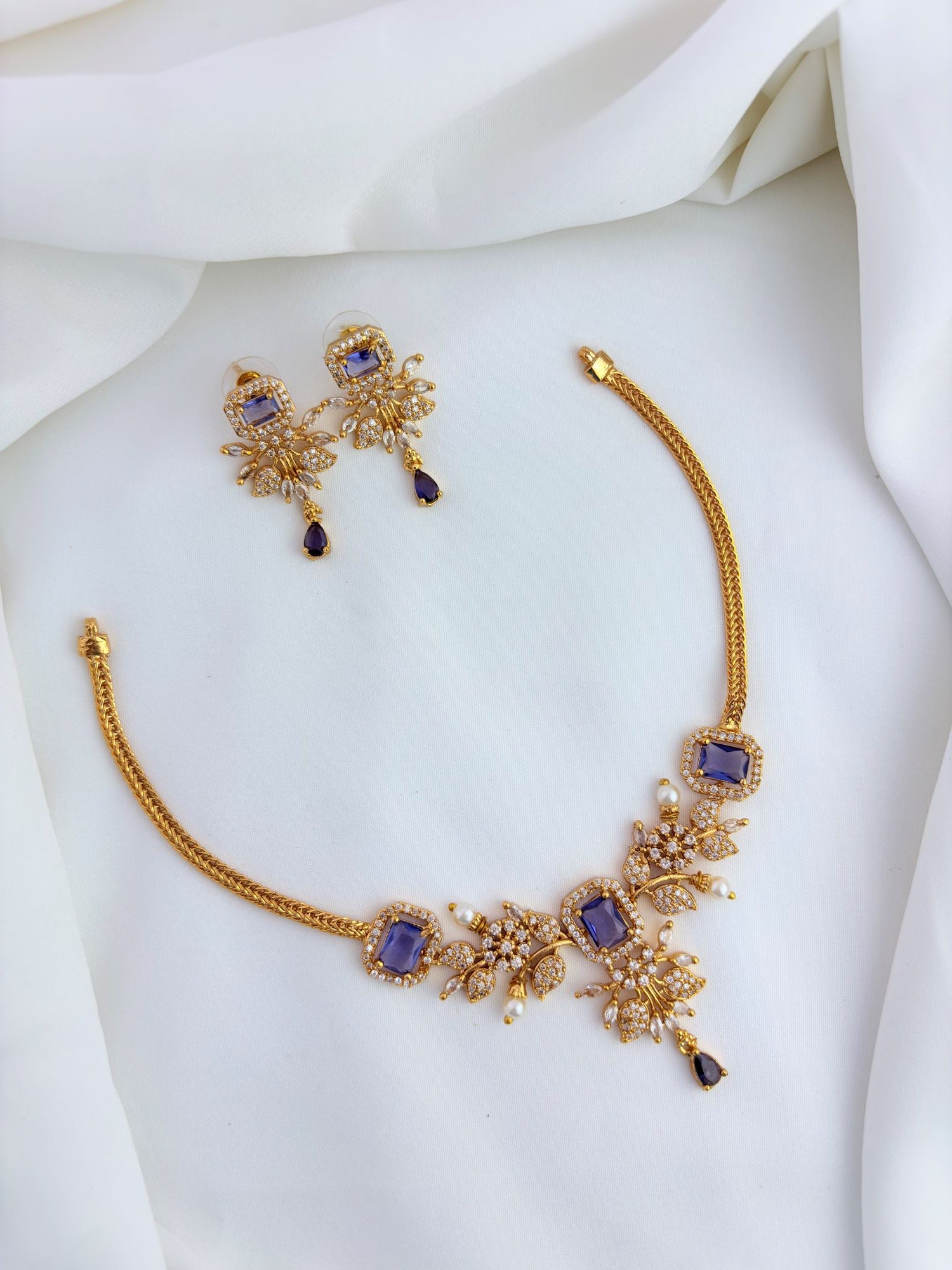 Classic stone necklace and earrings with premium matte texture