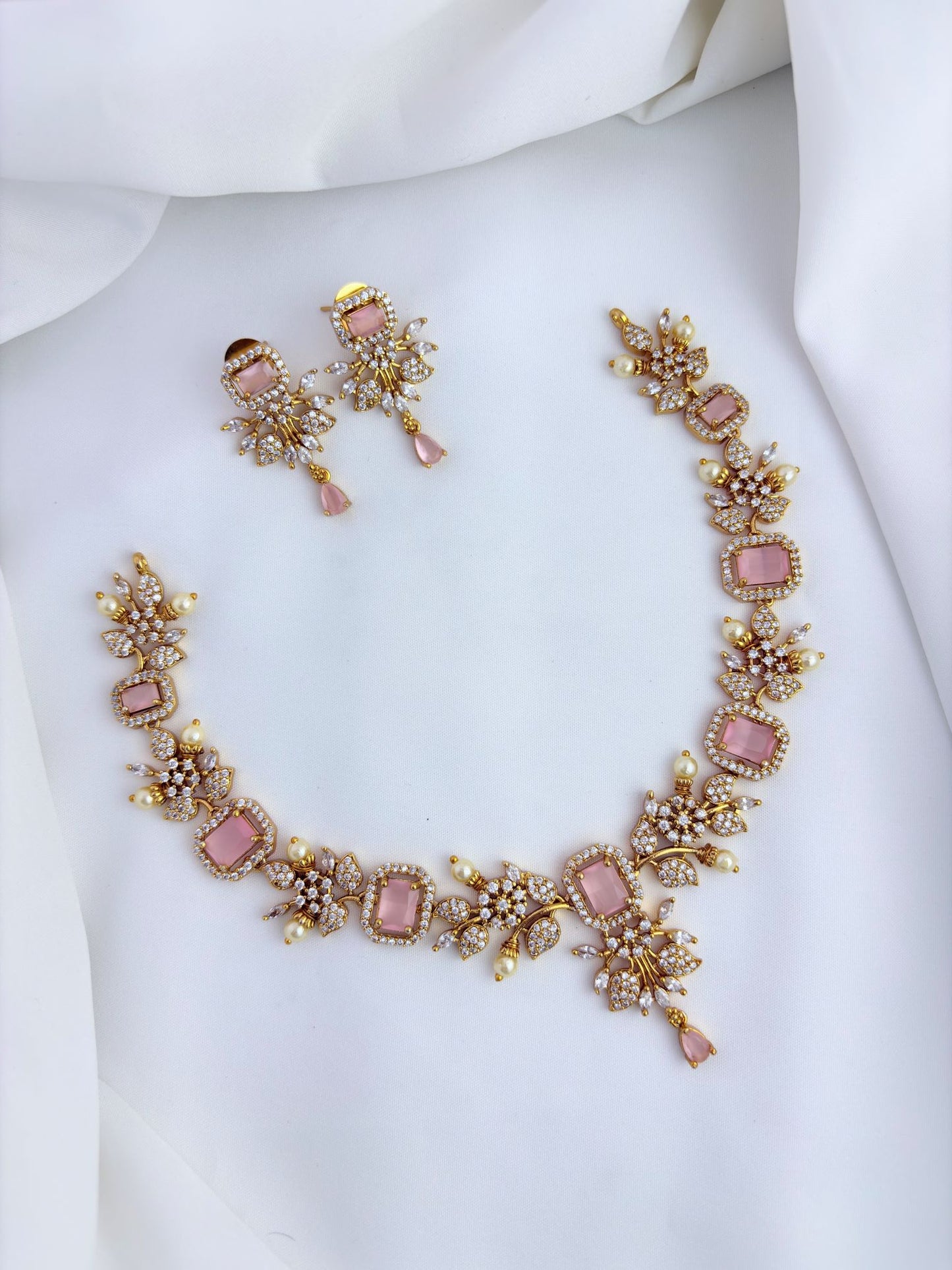 Premium matte finish neckset beautifully designed with pearls and stones