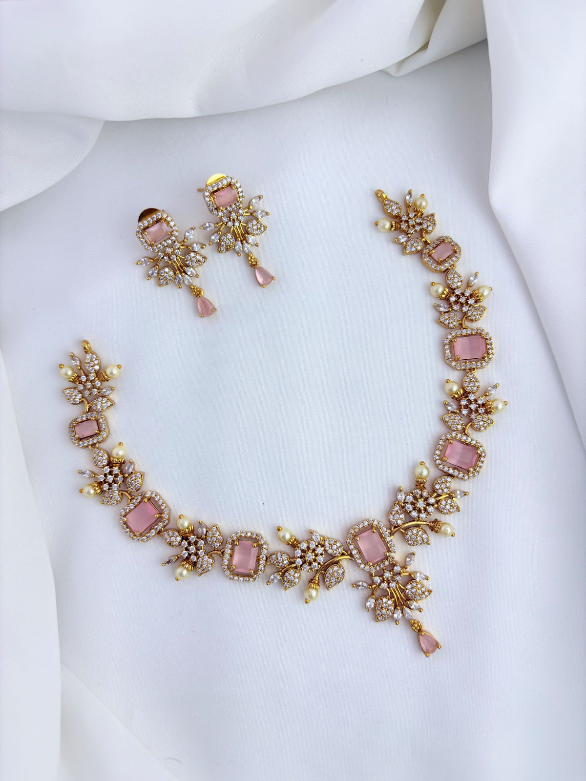 Premium matte finish neckset beautifully designed with pearls and stones