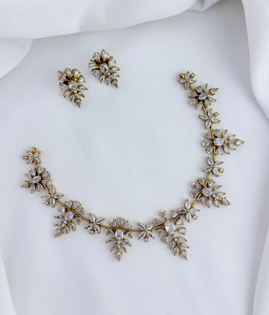 Sparkle with every step in this beautifully crafted CZ stone neckset.