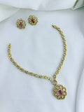 Classic matte finish floral pendant necklace and earrings adorned with CZ stones