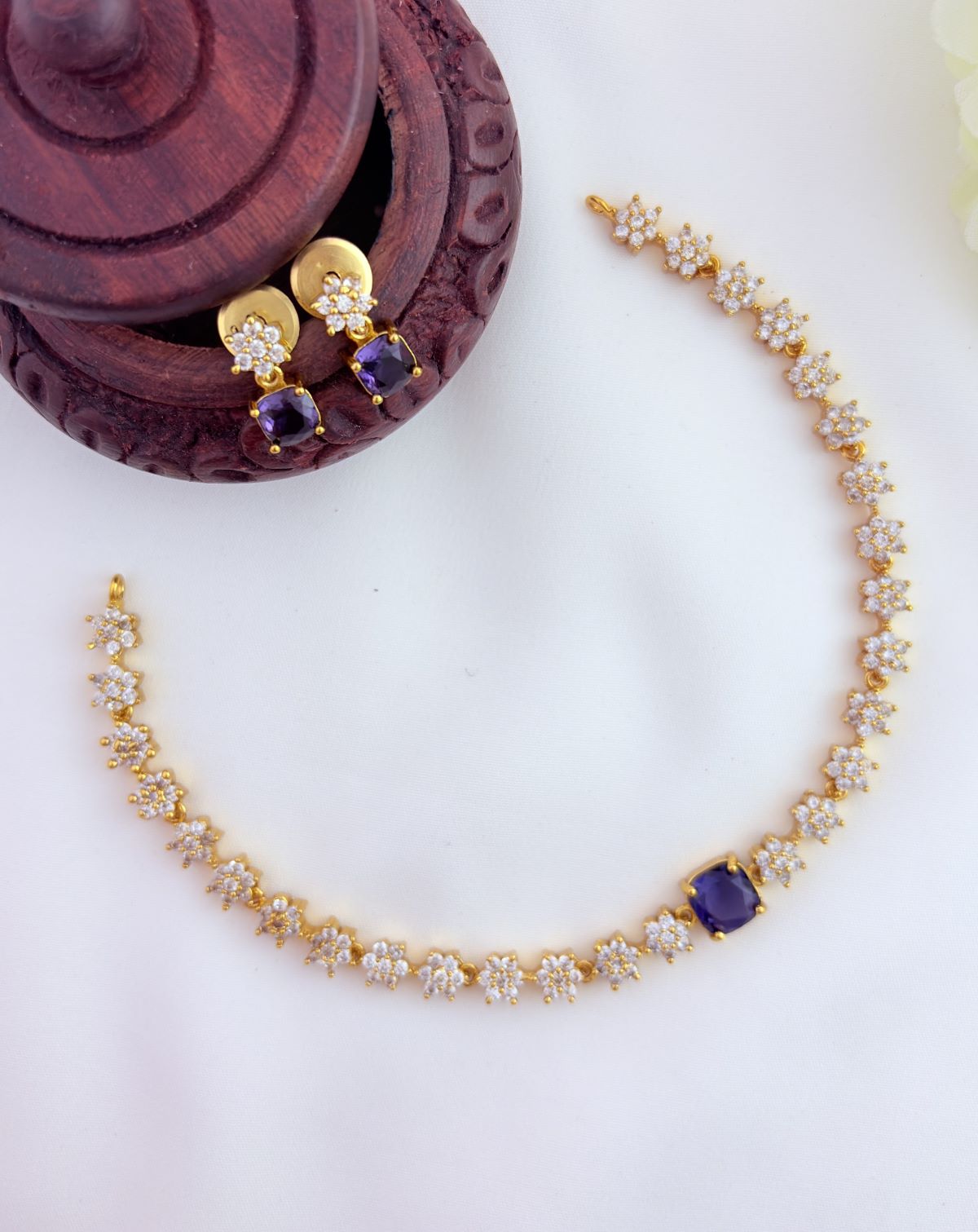 Premium matte finish floral pattern necklace beautifully crafted with AD stones