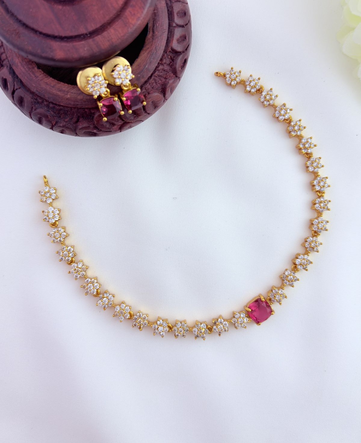 Premium matte finish floral pattern necklace beautifully crafted with AD stones
