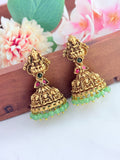 Temple-inspired Lakshmi jhumka in a premium finish beautifully adorned with green beads