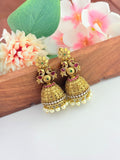 Ethnic statement jhumka with AD stone and pearl embellishments