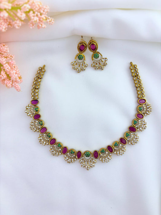 Premium matte finish AD neckset and earrings beautifully crafted wtih ruby and green stones