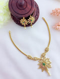 Stylish peacock pendant chain in premium finish beautifully crafted with AD stones and pearl drops