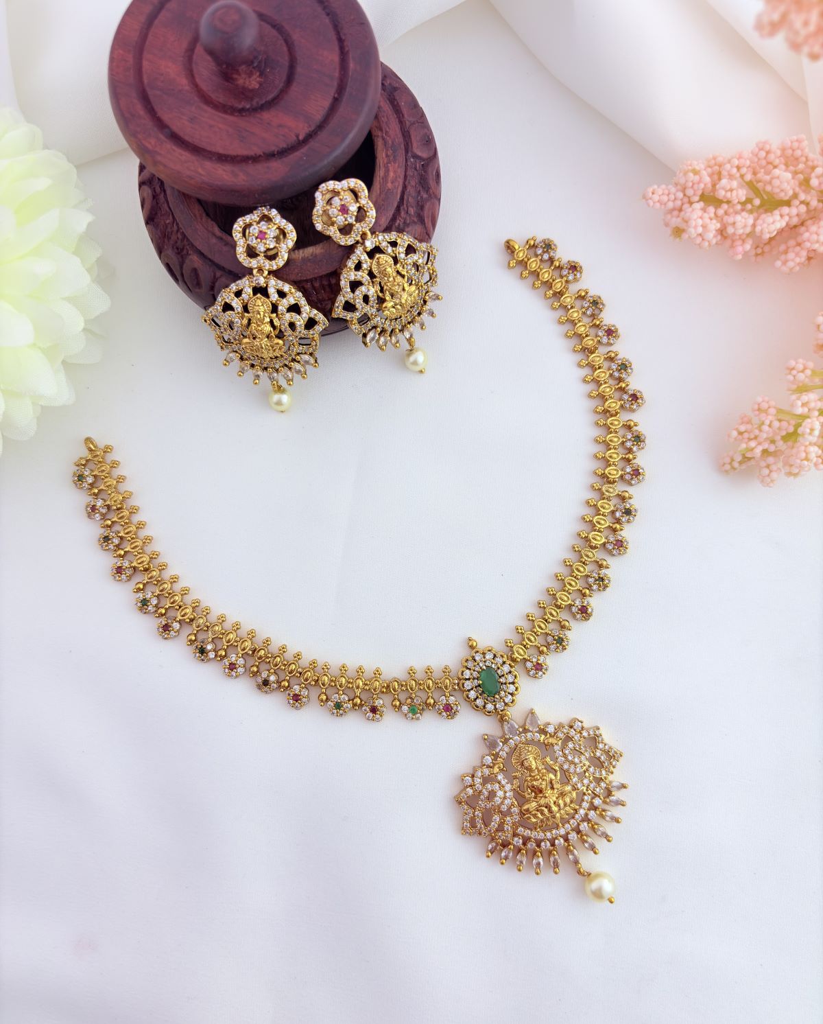 Temple jewellery - Premium matte finish Lakshmi pendant neckset aorned with AD stones and pearls