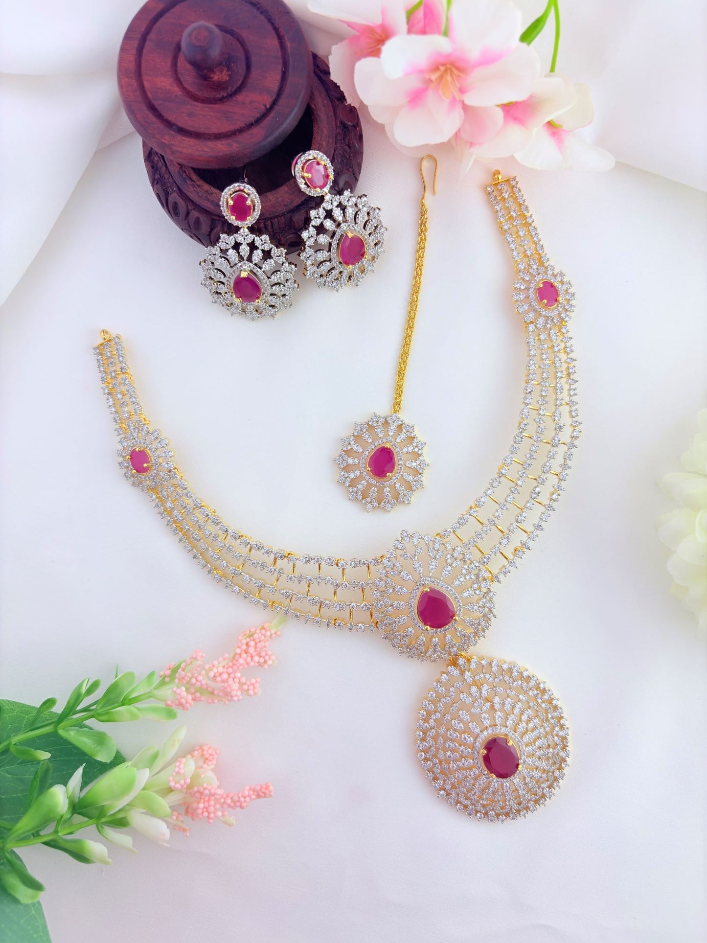 Premium AD sones that add brilliance and elegance -GJ finish neckset with earrings and tikka