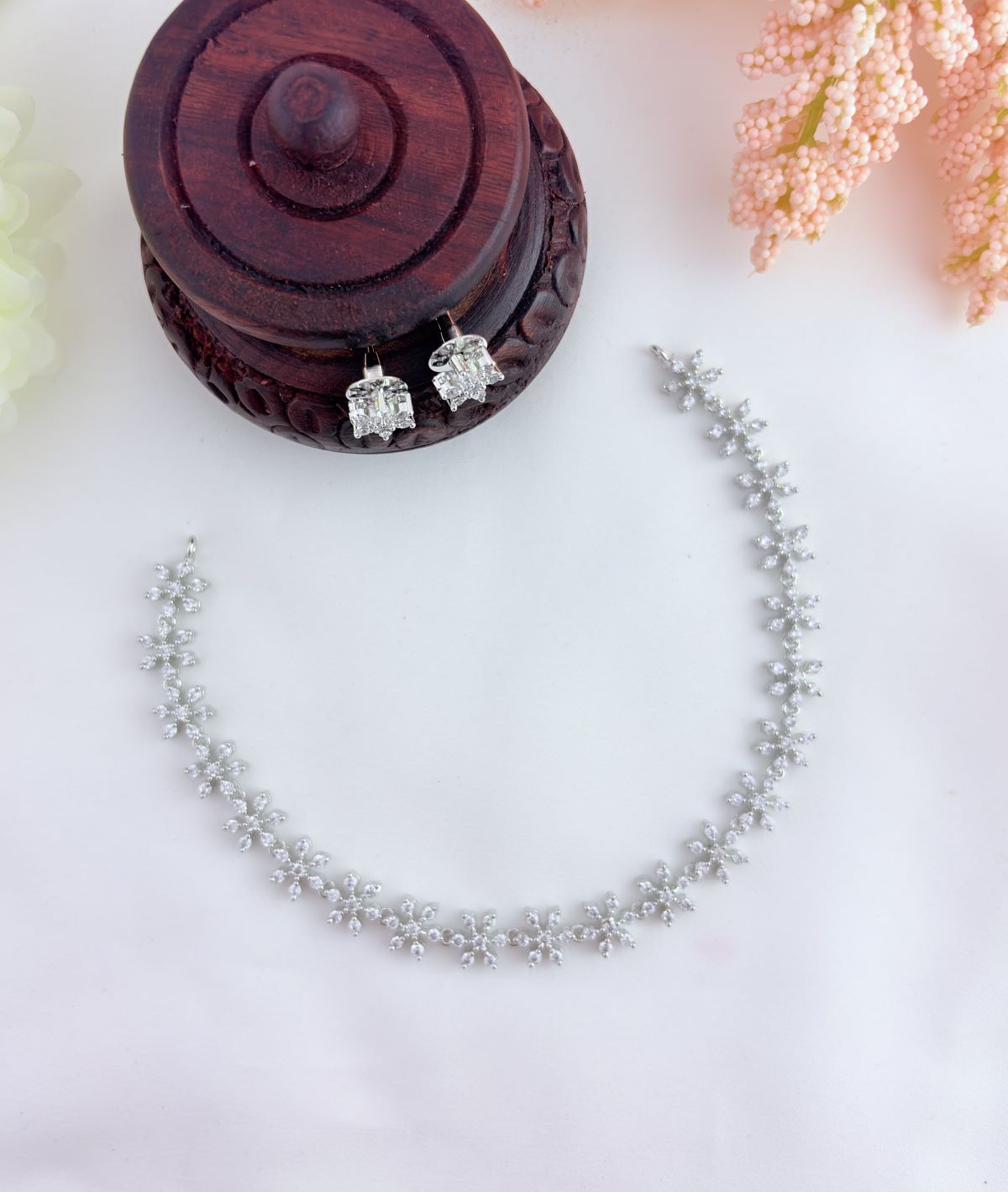 AD stone Neckset - Premium AD stone floral pattern neckset and earrings in silver finish