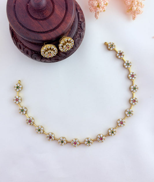 Perfect blend of tradition and elegance - Premium matte finish floral pattern AD stone neckset with matching earrings