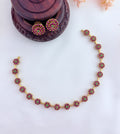 Perfect blend of tradition and elegance - Premium matte finish floral pattern AD stone neckset with matching earrings