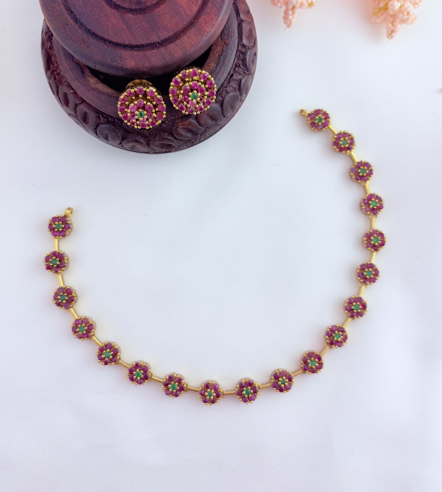Perfect blend of tradition and elegance - Premium matte finish floral pattern AD stone neckset with matching earrings