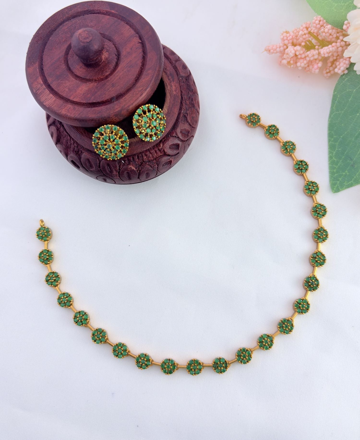 Perfect blend of tradition and elegance - Premium matte finish floral pattern AD stone neckset with matching earrings