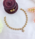Stylish and Elegance adorned with AD stones beautifully crafted floral pattern neckset with matching earrings