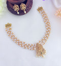 Beautiful Lakshmi pendant pearl choker with matching earrings