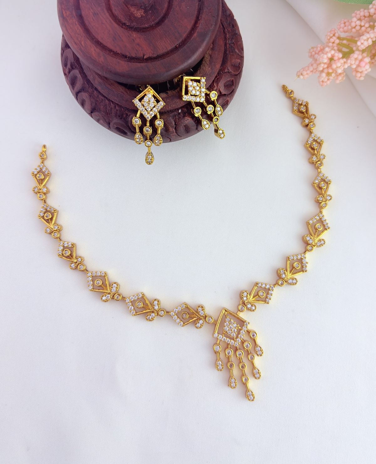 Tradition in modern elegance - Premium matte finish AD stone neckset with matching earrings