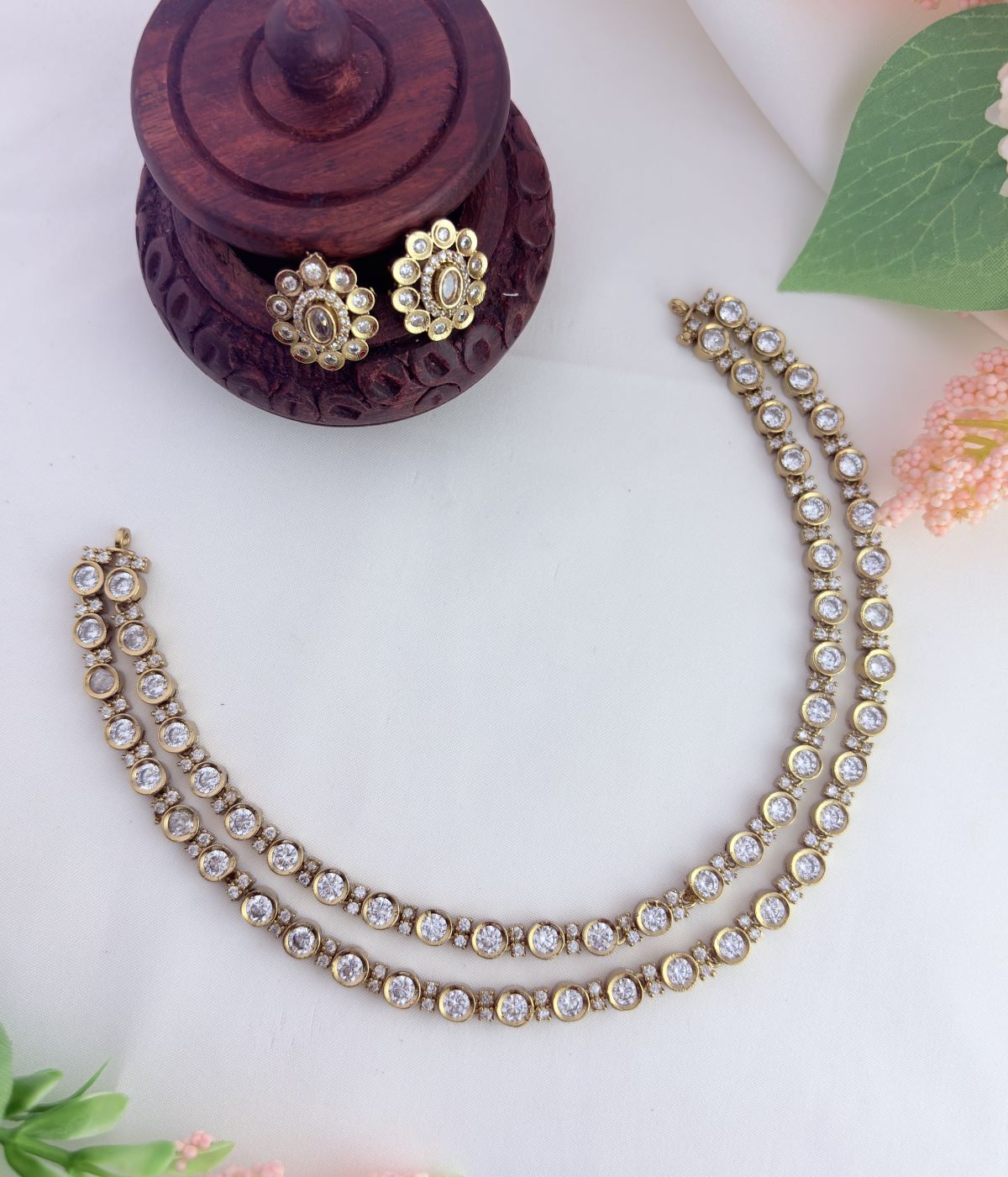 A perfect blend of style and elegance - Premium matte finish two layer neckset with sparkling AD stone accents -
