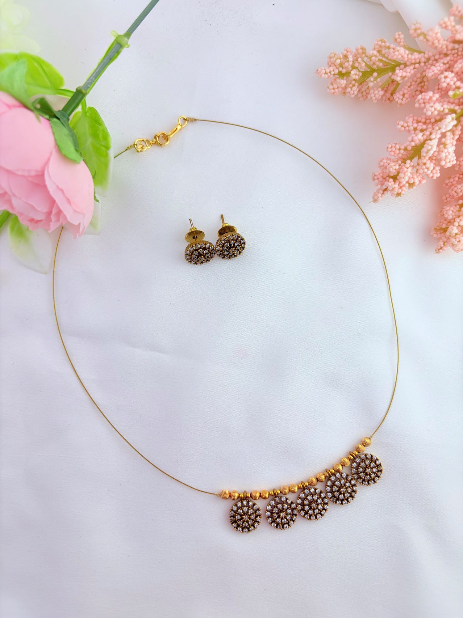 Elegant invisible chain adorned with a sparkling AD stone pendant