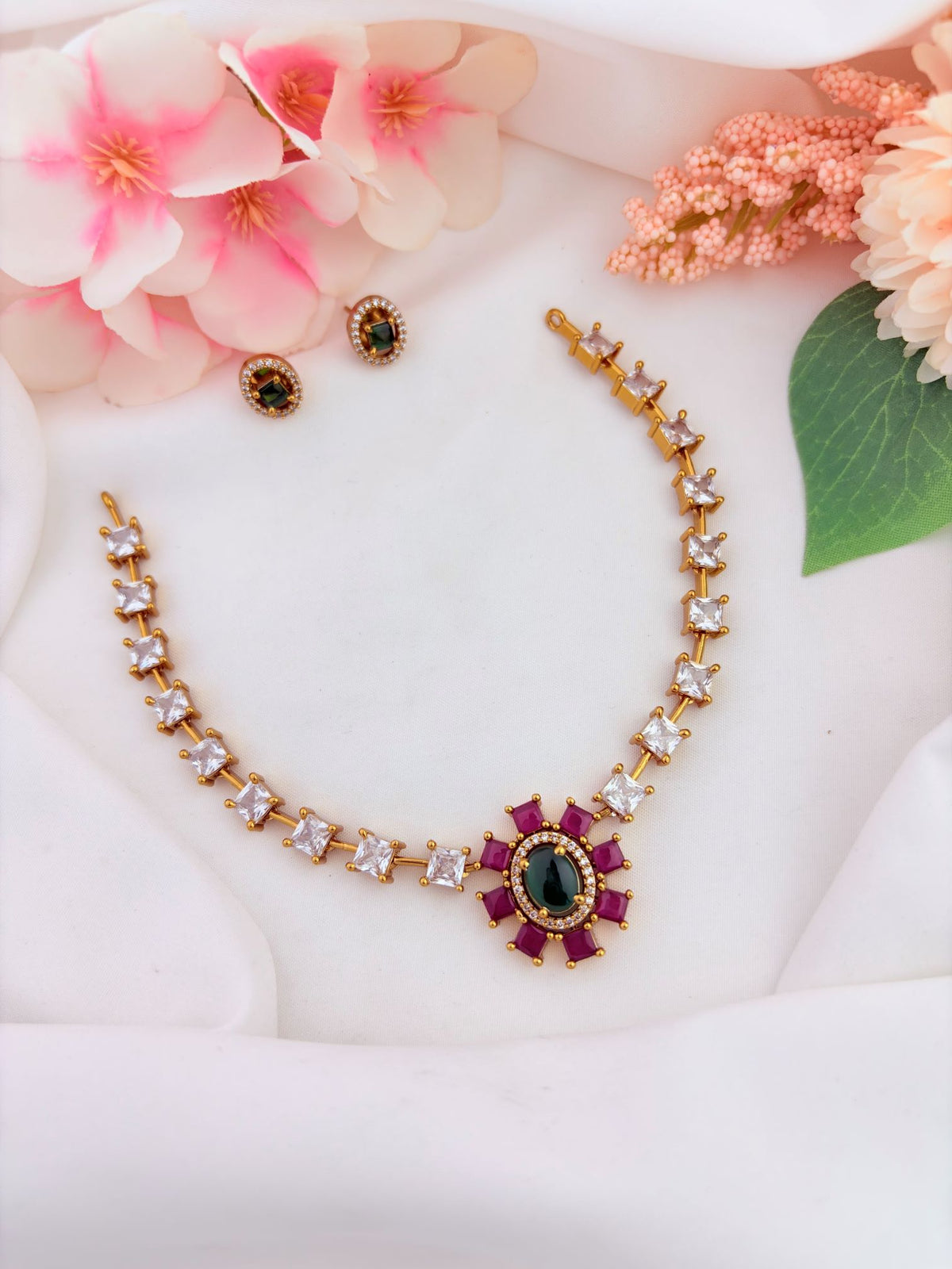 Elegant CZ neckset adorned with sparkling stones for a graceful and luxurious appearance.