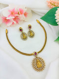 Premium matte finish neckset adorned with ruby and white stones for a rich traditional look