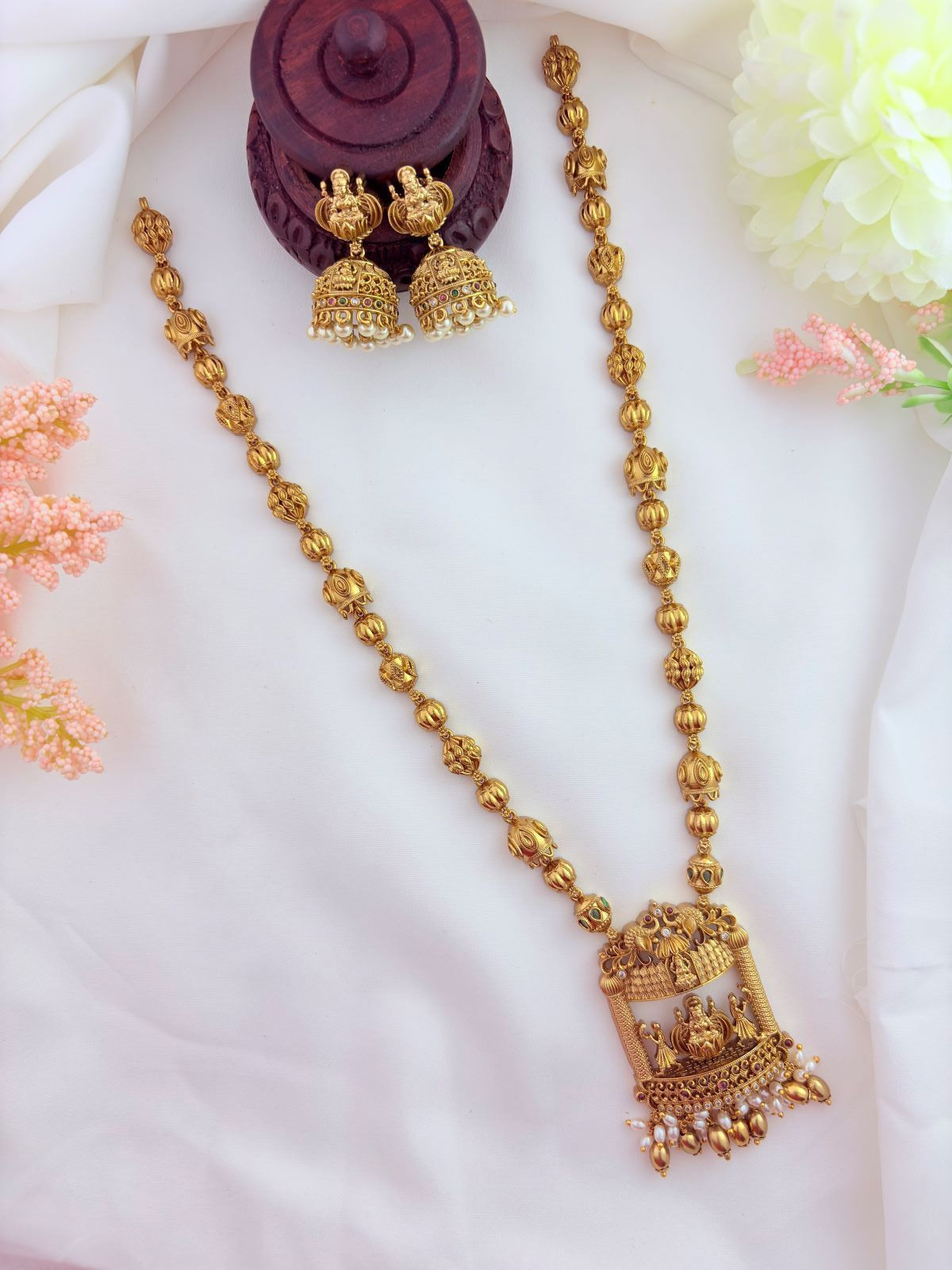 Temple jewellery - Premium matte finish lakshmi pendant haram adorned with golden and pearl drops