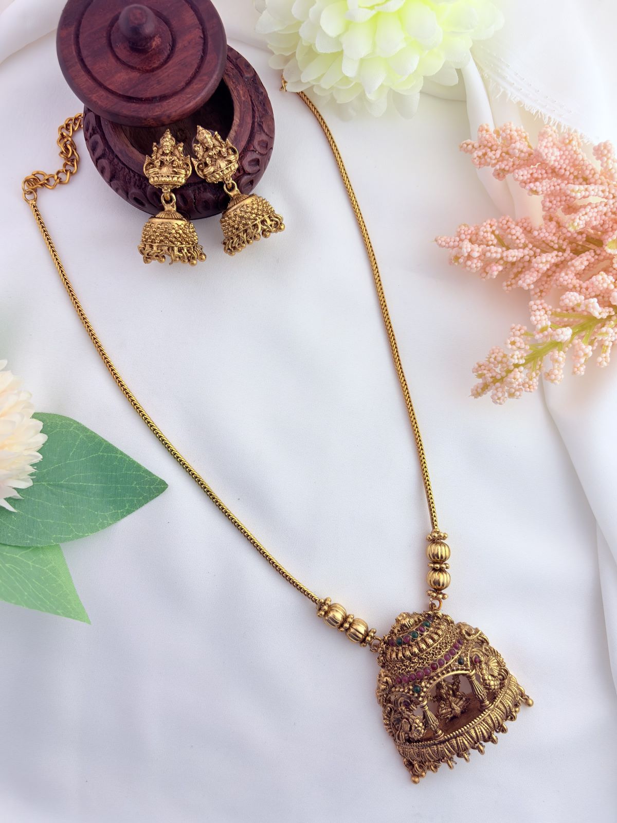 Temple jewellery - Matte finish pendant set with matching jhumka beautifully adorned wtih golden beads