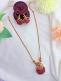 Tradition in modern elegance - krishna pendant set and earrings beautifully adorned with colorfull beads