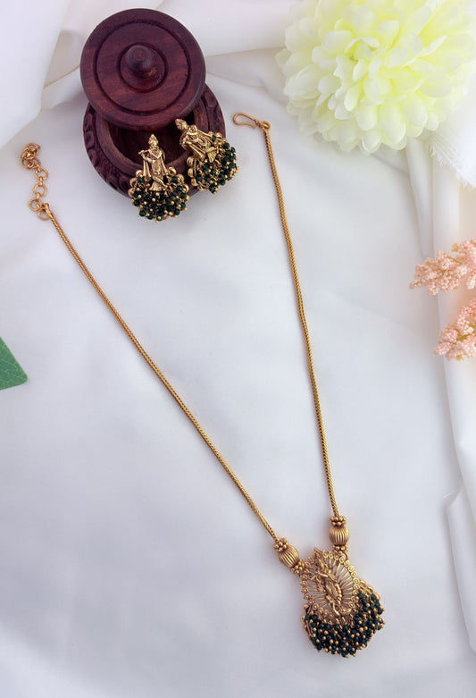 Tradition in modern elegance - krishna pendant set and earrings beautifully adorned with colorfull beads
