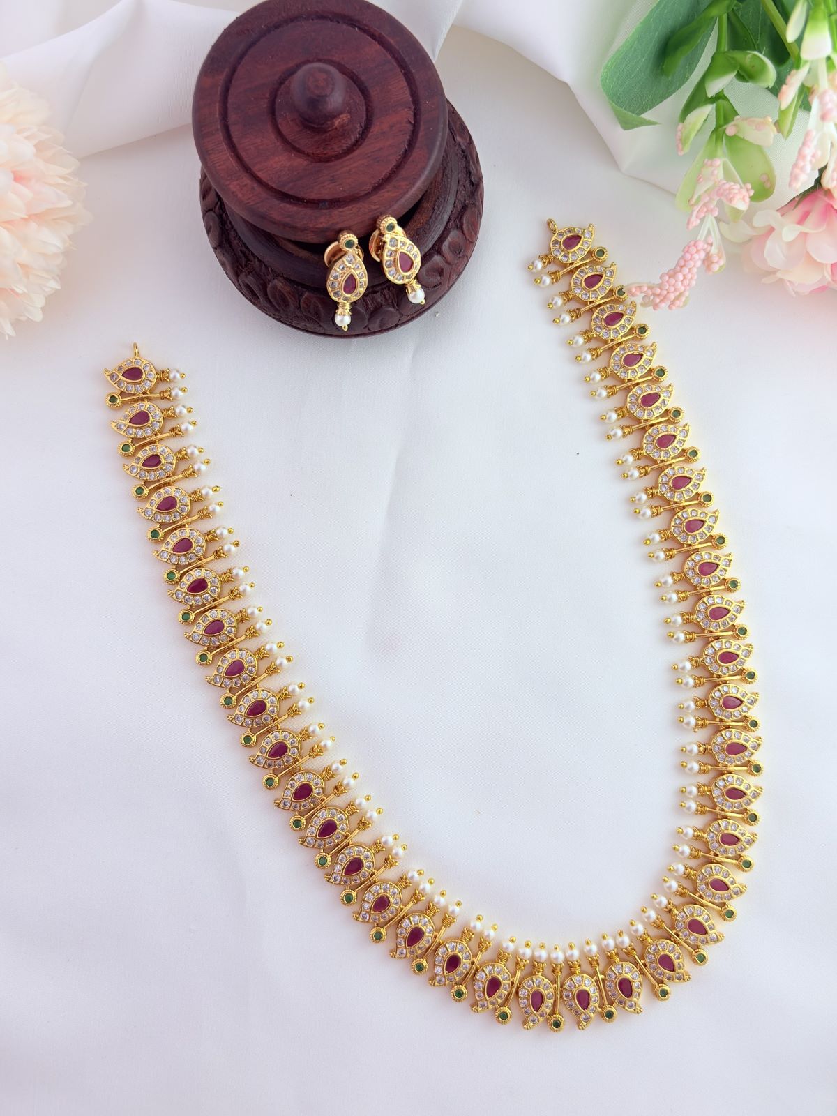 Traditional mango pattern haram adorned with AD stones and pearls