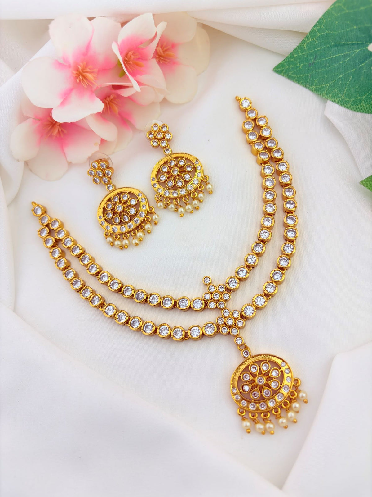 Traditional attigai pattern two layer neckset adorned with pearl drops