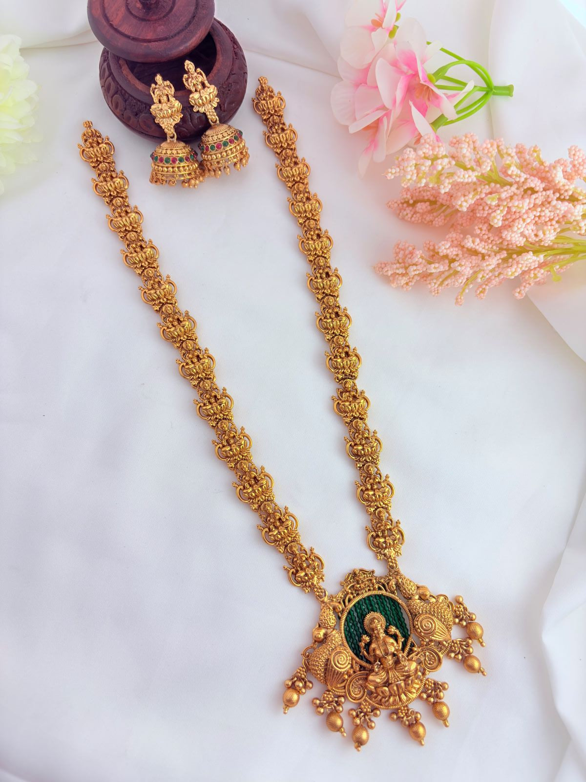 Classic matte finish offering a traditional antique look - Lakshmi pendant haram with matching jhumka