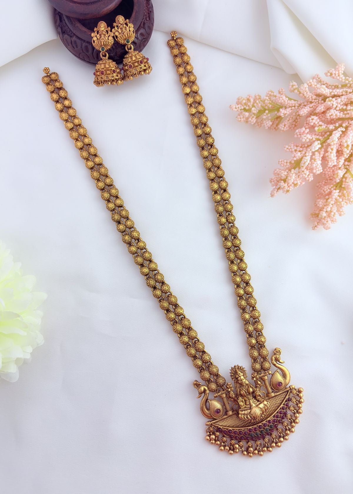 Lakshmi pendant haram adorned with elegant golden beads for a timeless traditional look