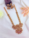 Gracefully designed peacock pendant haram with matte detailing and golden beads