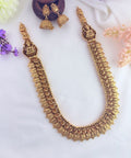Traditional kaasu maalai pattern and peacock motif in single haram with rich antique finish