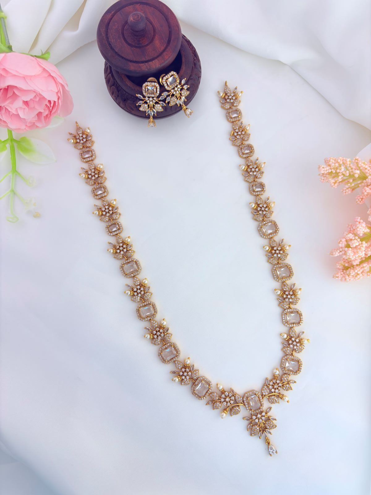 Elegant haram featuring vibrant AD stones, pearls in premium matte finish