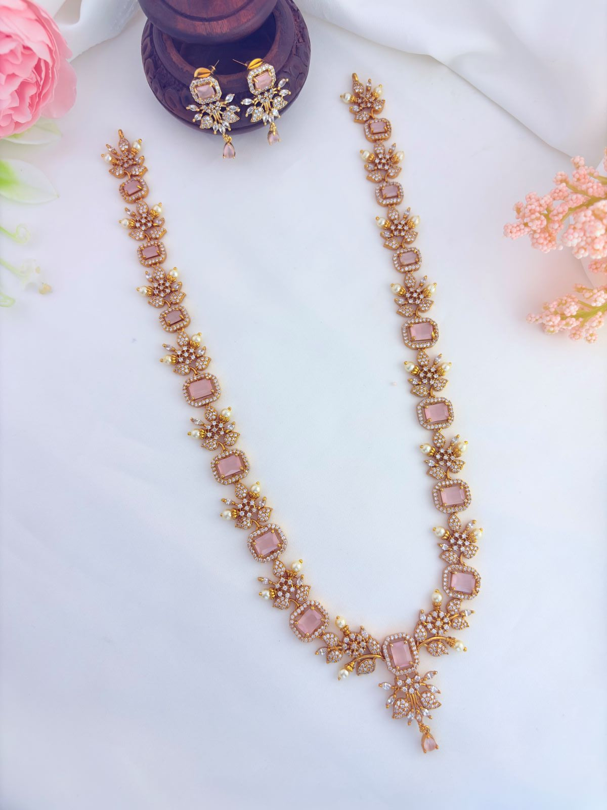 Elegant haram featuring vibrant AD stones, pearls in premium matte finish