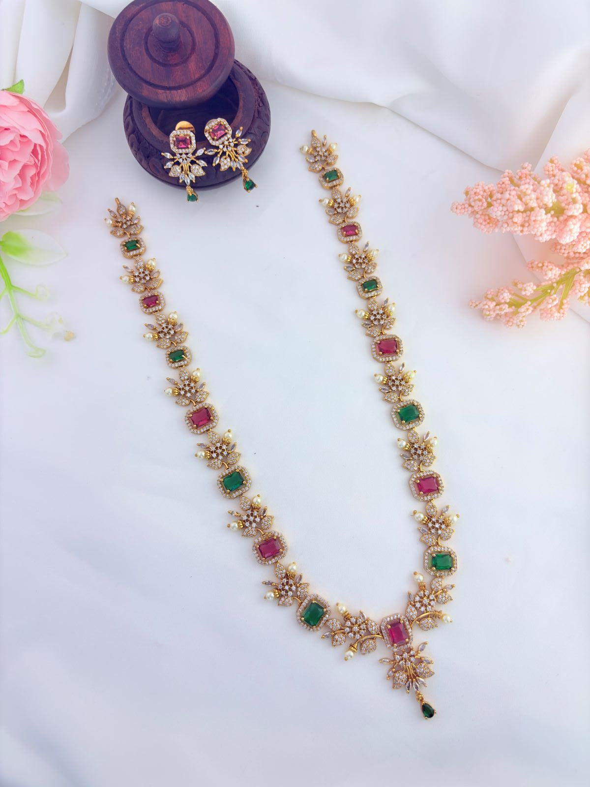 Elegant haram featuring vibrant AD stones, pearls in premium matte finish