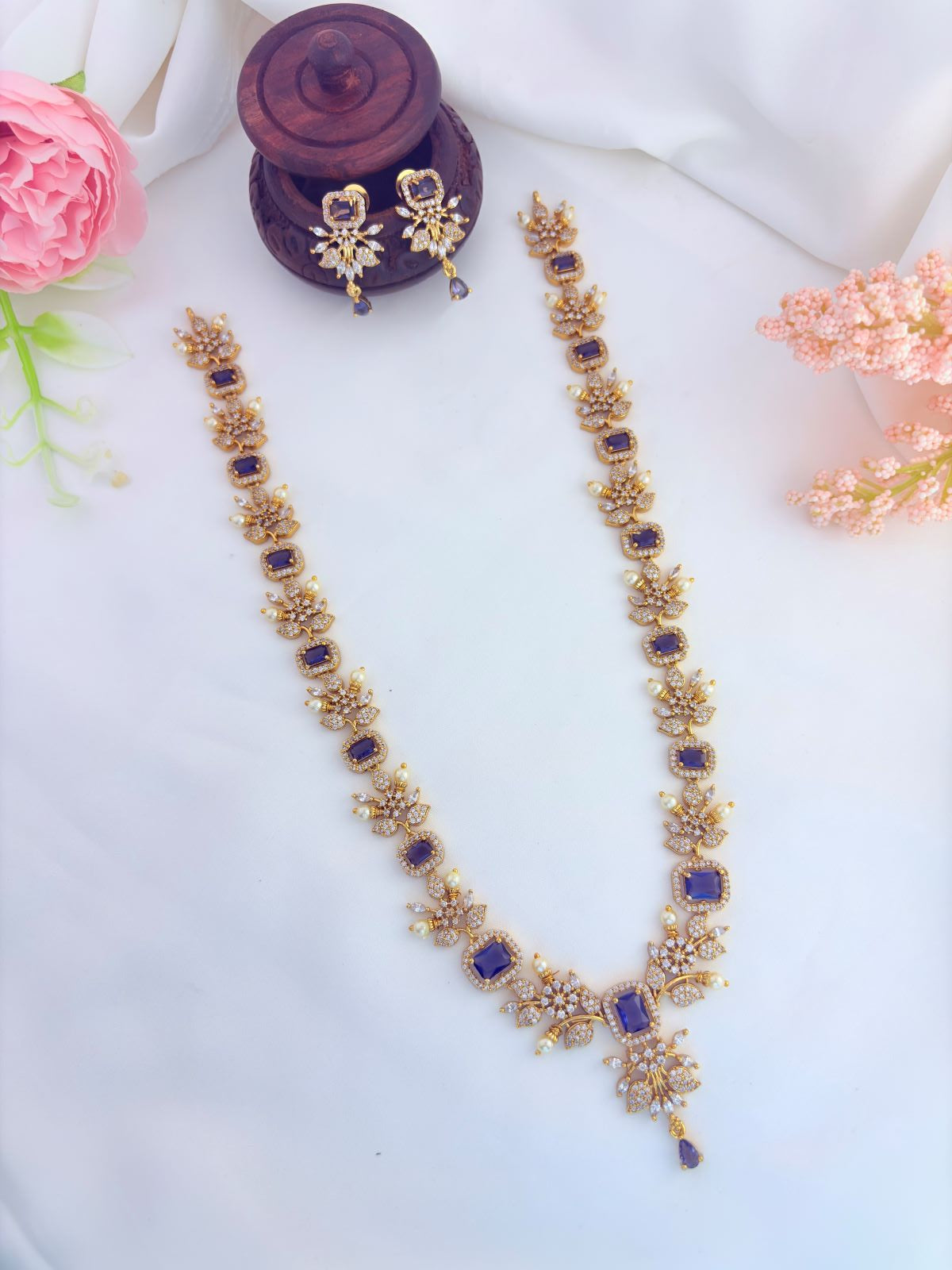 Elegant haram featuring vibrant AD stones, pearls in premium matte finish