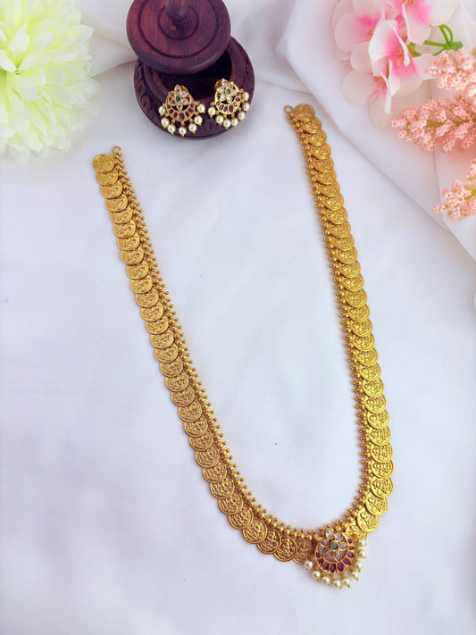 Classic kaasu maalai pattern and matching earrings beautifully adorned with AD stones and pearl drops