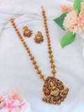 Gracefully crafted Lakshmi pendant featuring intricate temple motifs