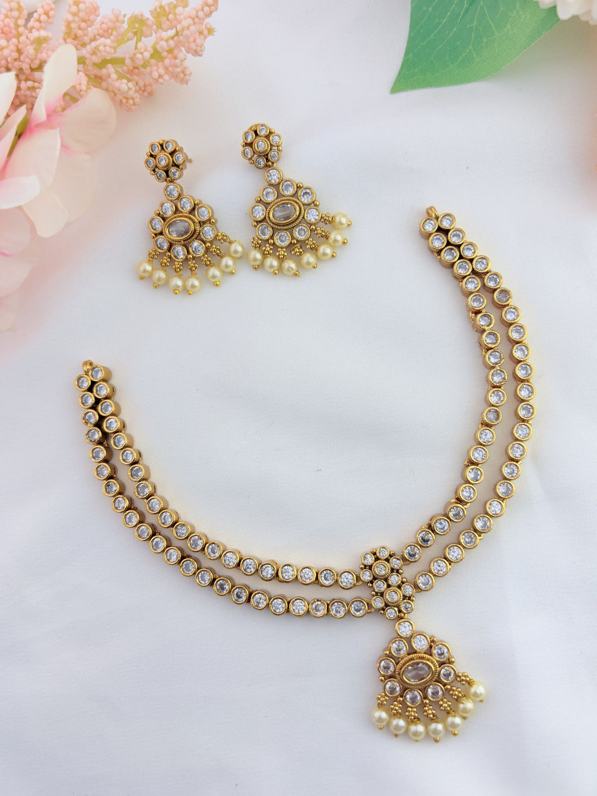 Tradition in modern elegance - Two layer AD neckset beautifully crafted with pearl drops