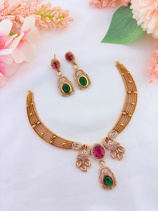 Trending hasli pattern peacock neckset adorned with ruby and green stones