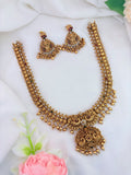 Matte finish neckset adorned with golden beads