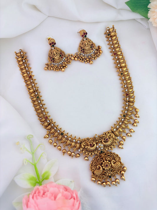 Matte finish neckset adorned with golden beads