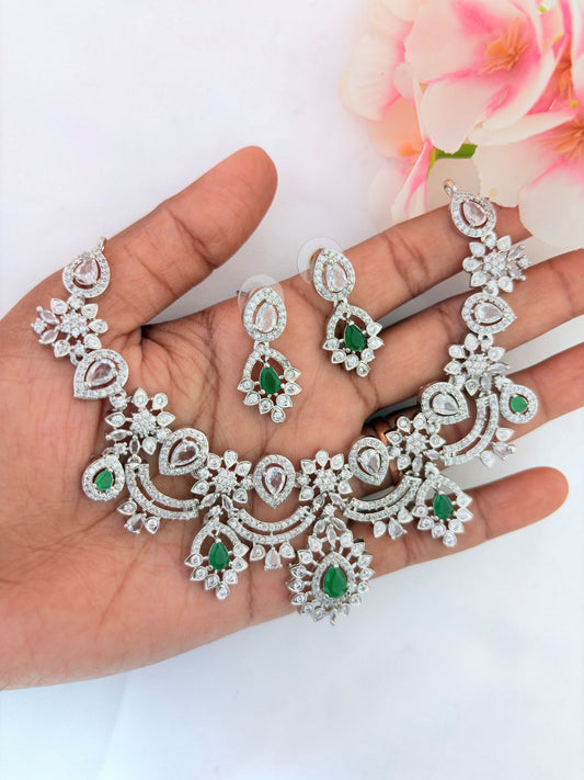 Premium AD neckset in silver finish adorned with green stones