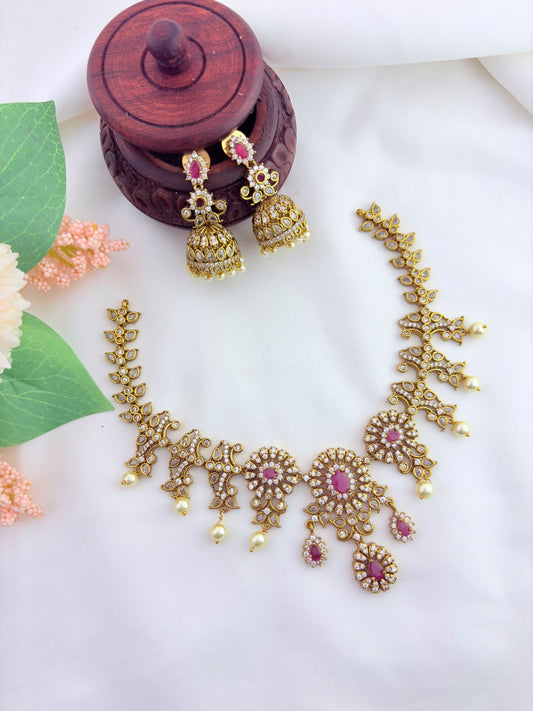 Premium matte finish AD neckset beautifully adorned with ruby stones and beads