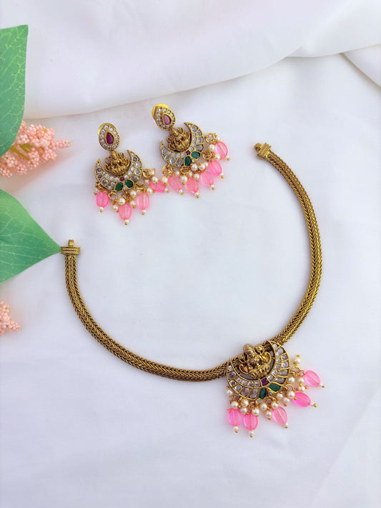 Tradition in Premium antique finish lakshmi pendant neckset with matching earrings