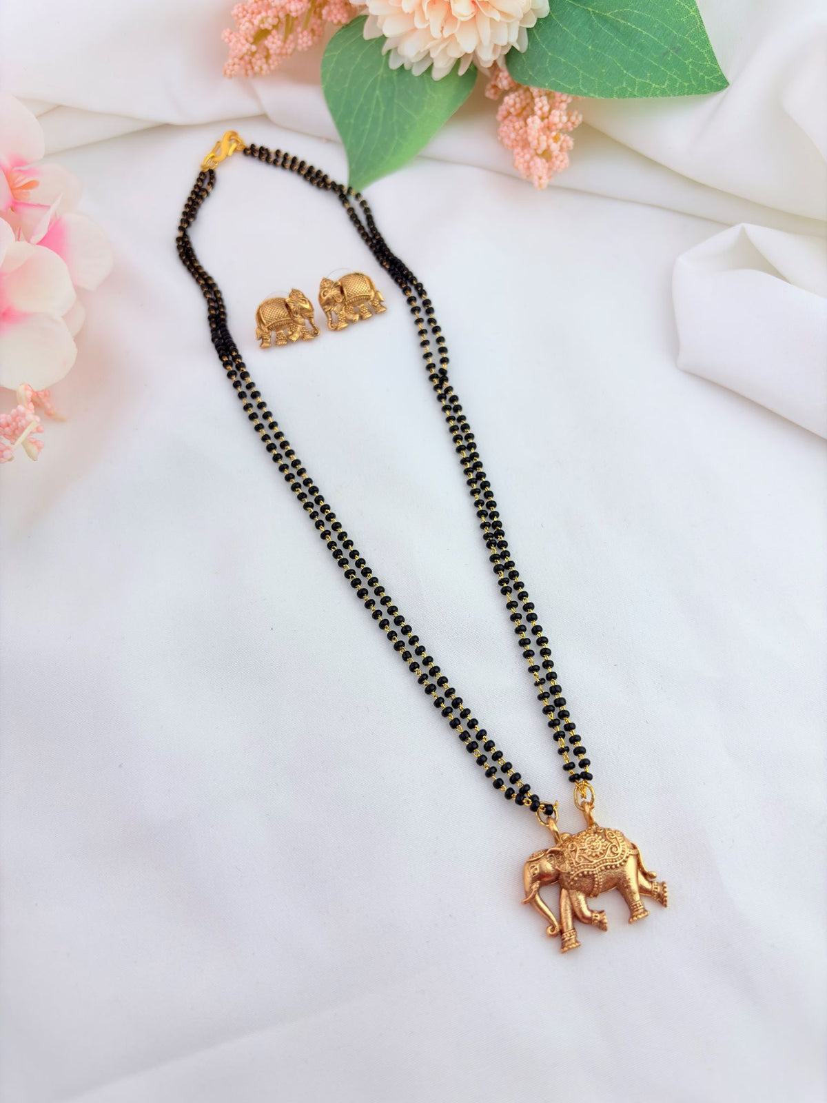 Elephant pendant black bead short chain